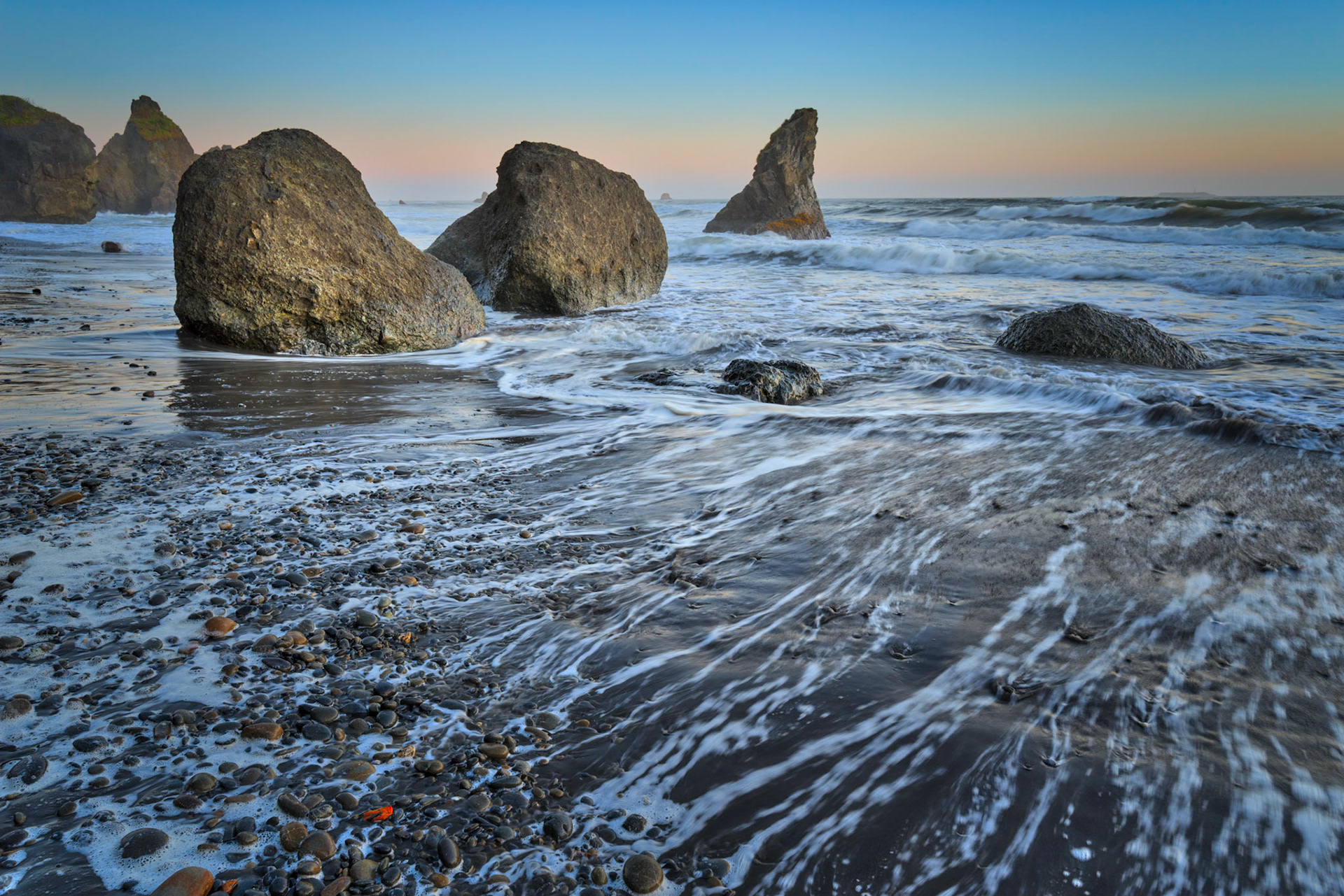 Near high tide just after sunset at Ruby Beach.Olympic National ParkWashingtonJuly 29, 2016This is an HDR image consisting of 5 exposures merged in AuroraHDR.  Additional processing in Lightroom.PENTAX K-1, HD PENTAX-D FA 15-30mm F2.8ED SDM WRISO 100 24 mm  ¹⁄₁₀ sec at ƒ / 11