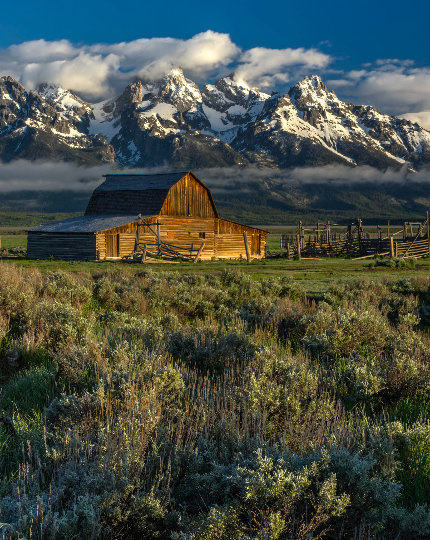 The John Moulton barn on Mormon Row.Grand Teton National Park15 June 2014PENTAX K-3, Sigma 18-250mm f/3.5-6.3 DC OS HSMISO 100 45 mm  ¹⁄₁₃ sec at ƒ / 14Prints of my work are available from my website at http://www.fingolfinphoto.comFollow me on Facebook at http://www.facebook.com/fingolfinphoto or http://www.facebook.com/pesterleAlso, http://500px.com/pesterle   http://www.flickr.com/photos/fingolfinphoto