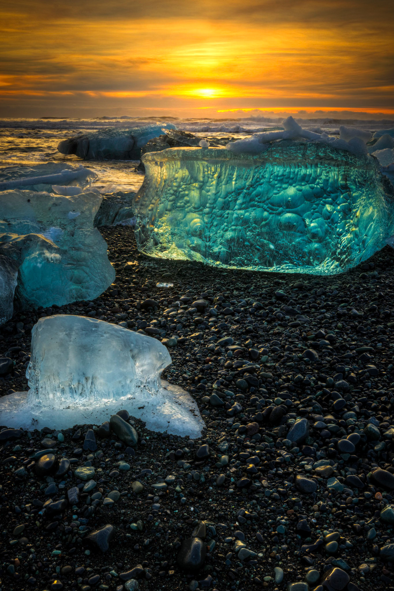 Sunrise at the ice beach at the outlet of Jökullsárlón.Austurland, IcelandFebruary 2, 2016This is an HDR image consisting of 5 exposures merged in Photomatix Pro. Additional processing in Lightroom and Photoshop.PENTAX K-3, Sigma 10-20mm f/4-5.6 EX DCISO 100 19 mm  0.3 sec at ƒ / 18