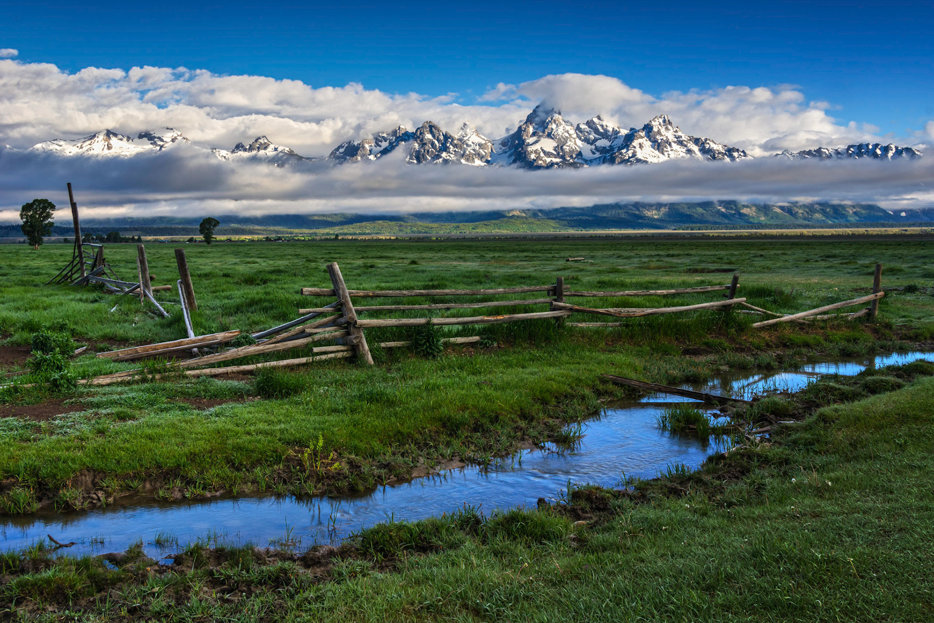 The remains of a wooden fence near the John Moulton Barn on Mormon Row.Grand Teton National Park15 June 2014PENTAX K-3, Sigma 18-250mm f/3.5-6.3 DC OS HSMISO 100 21 mm  ¹⁄₂₀ sec at ƒ / 11Prints of my work are available from my website at http://www.fingolfinphoto.comFollow me on Facebook at http://www.facebook.com/fingolfinphoto or http://www.facebook.com/pesterleAlso, http://500px.com/pesterle   http://www.flickr.com/photos/fingolfinphoto