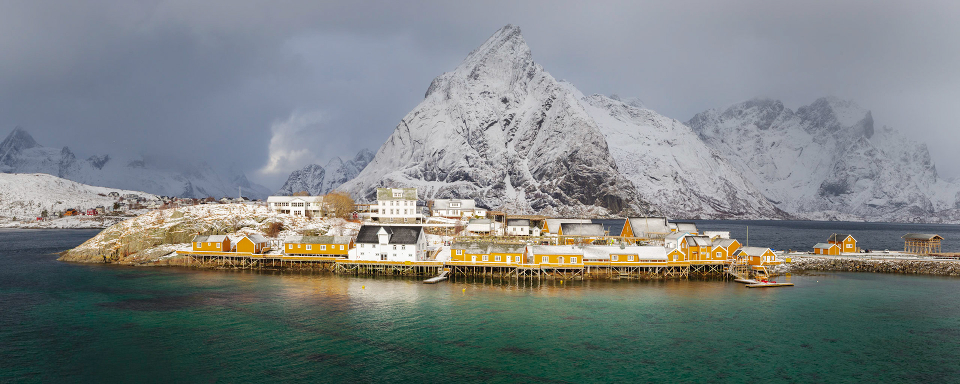 The island community of Sakrisøya, near the village of Reine.Reine, Nordland, NorwayMarch 18, 2018This is a panoramic images consisting of 3 frames stitched in Photoshop. Additional processing in Lightroom and Photoshop.PENTAX K-1, HD PENTAX-D FA 24-70mm F2.8ED SDM WRISO 400 40 mm  ¹⁄₂₀₀ sec at ƒ / 13