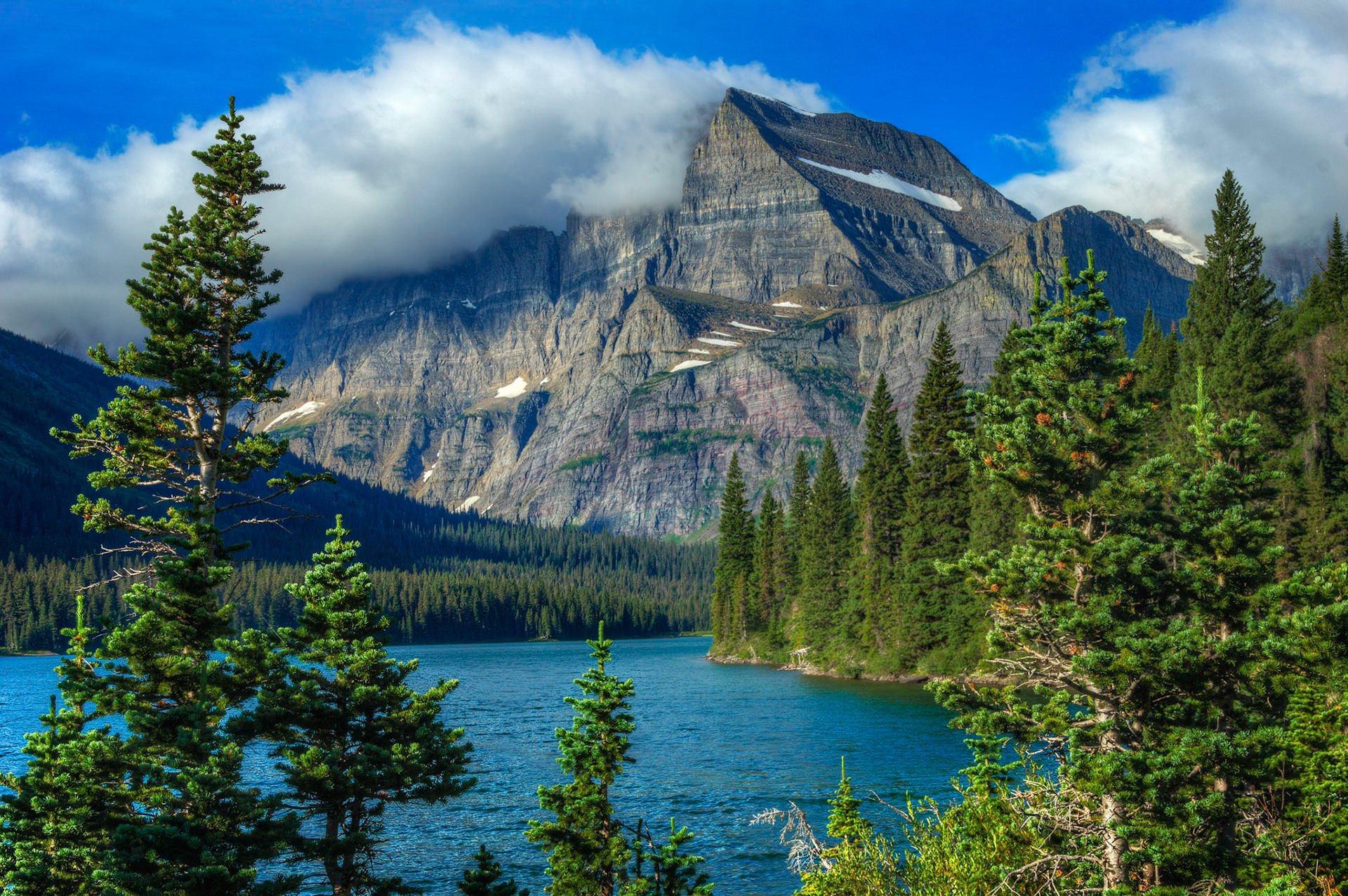 Mount Gould and Angel Wing, over Lake Josephine.Glacier National ParkJuly 28, 2015This is an HDR image consisting of 5 exposures merged in Photomatix Pro. Additional processing in Lightroom and Photoshop.PENTAX K-3, Sigma 18-250mm f/3.5-6.3 DC OS HSMISO 100 37 mm  ¹⁄₄₀ sec at ƒ / 11