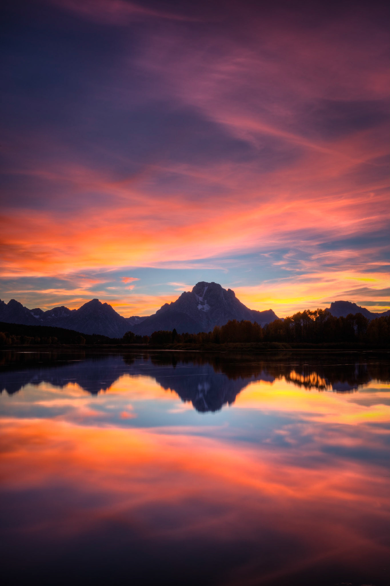 A truly amazing sunset at Oxbow Bend of the Snake River.Grand Teton National ParkWyomingSeptember 26, 2016This is an HDR image consisting of 10 exposures merged in Photomatix Pro. Additional processing in Lightroom and Photoshop.PENTAX K-1, TAMRON 28-300mm F3.5-6.3 Ultra zoom XRISO 100 39 mm  4.0 sec at ƒ / 18