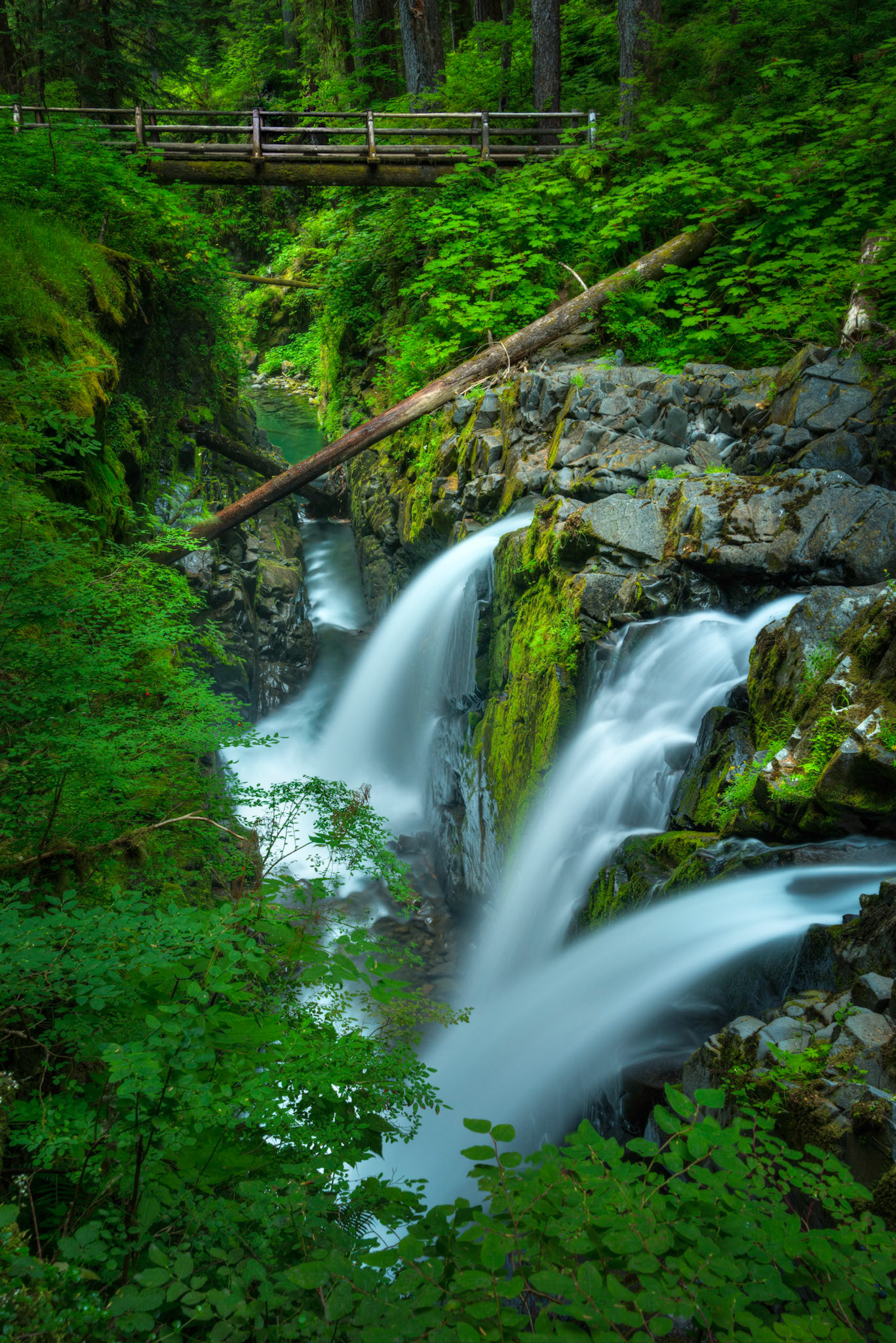 Sol Duc Falls, looking downstream.Olympic National ParkWashingtonAugust 2, 2016This is an HDR image consisting of 5 exposures merged in Photomatix Pro. Additional processing in Lightroom and Photoshop.PENTAX K-1, TAMRON 28-300mm F3.5-6.3 Ultra zoom XRISO 100 28 mm  5.0 sec at ƒ / 14
