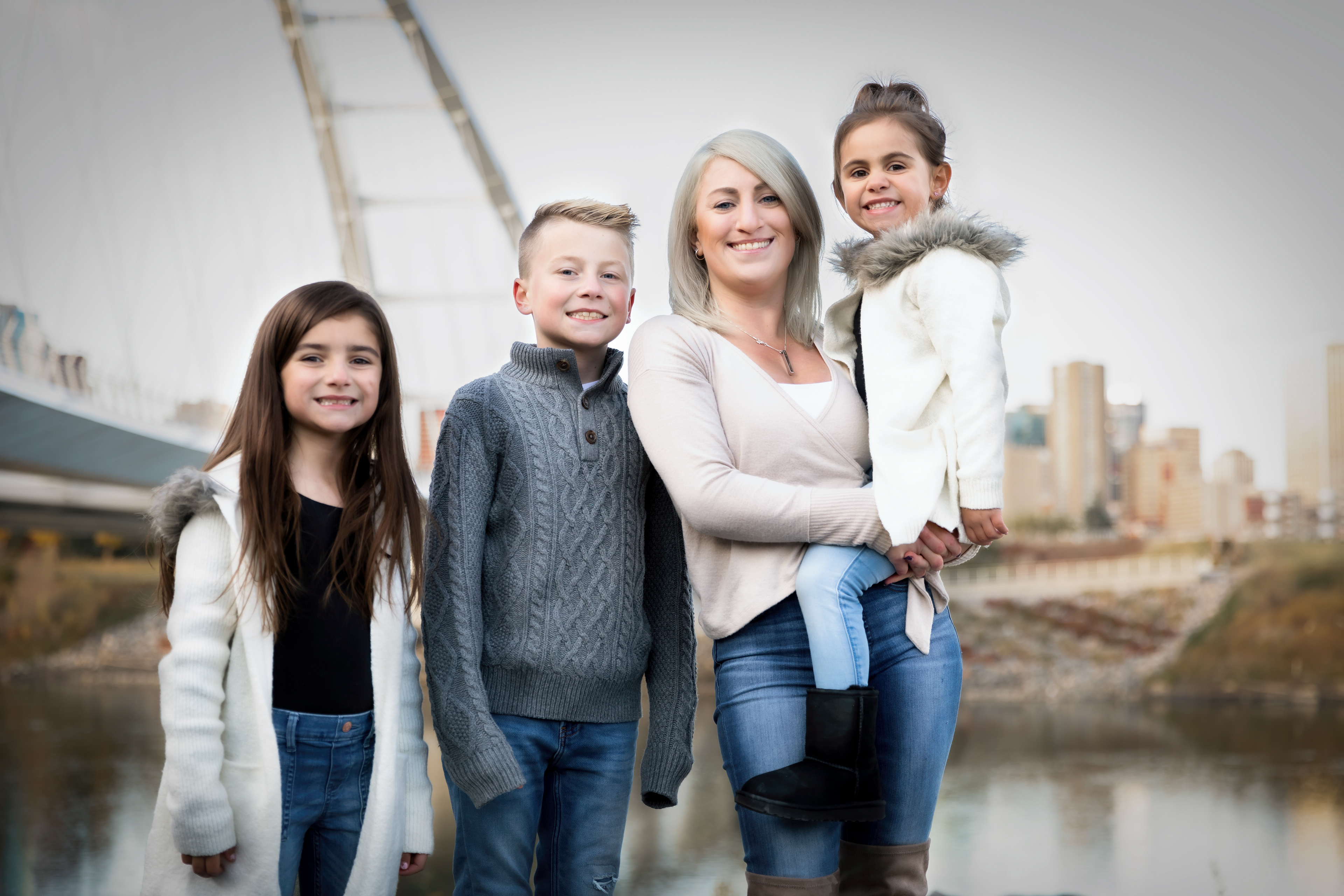 mom and kids laughing outside