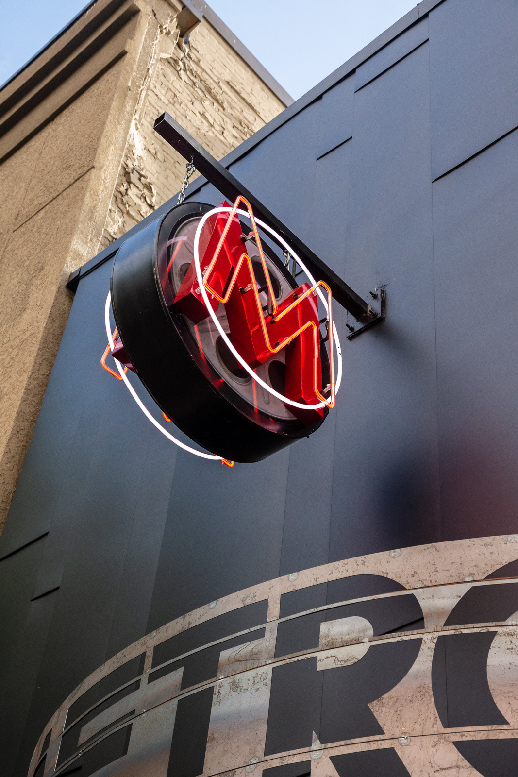 Neon sign and facade of Broadway Metro movie theater in downtown Eugene