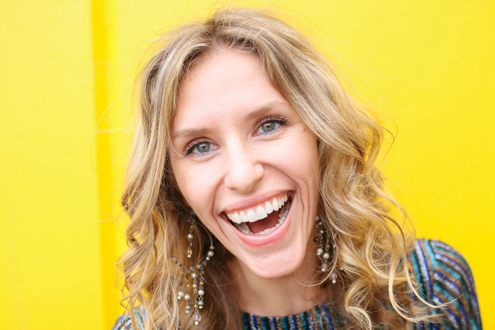 Bright portrait of woman with big smile