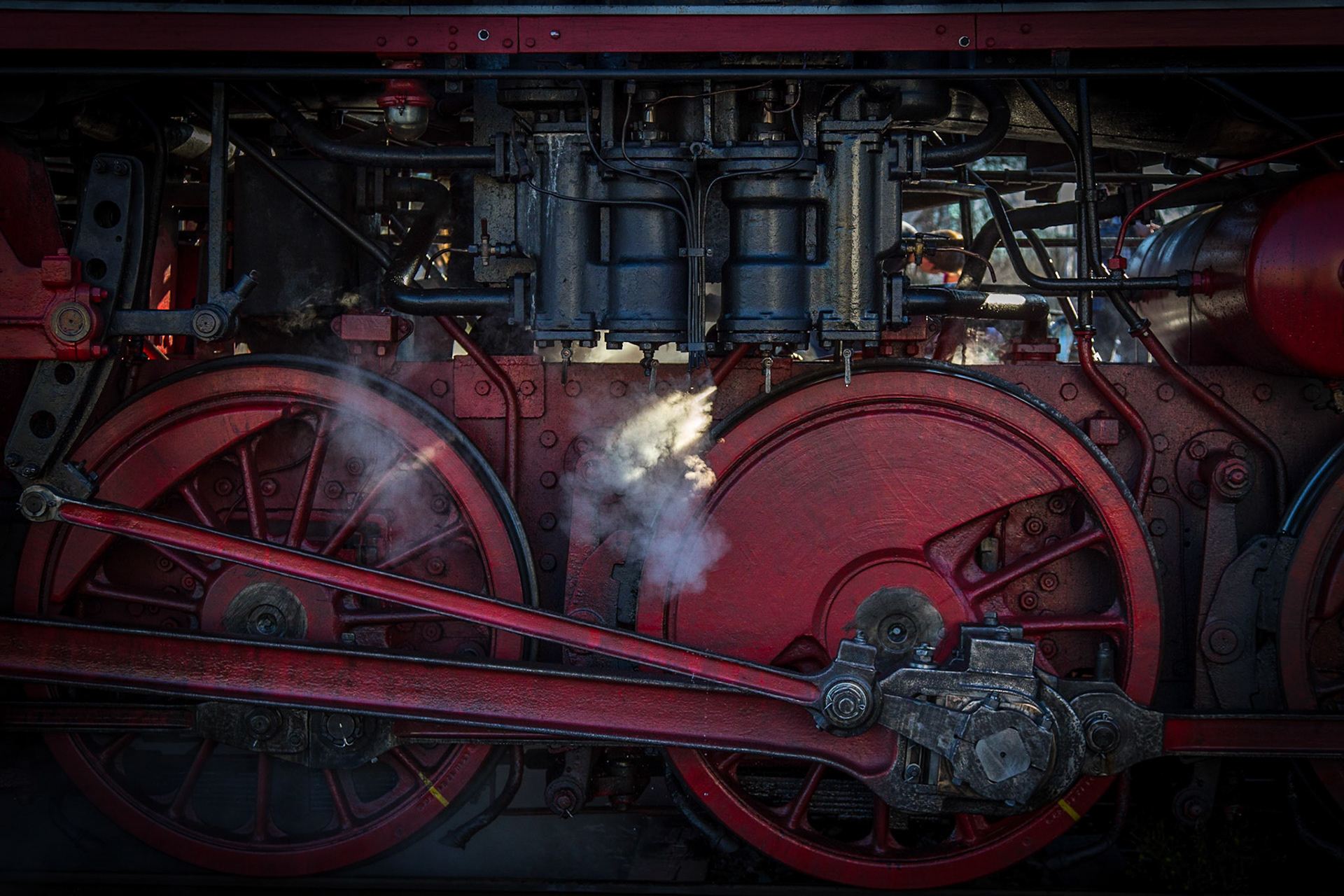 Old steam engine (lokomotive) heating up for a railway ride in Munich