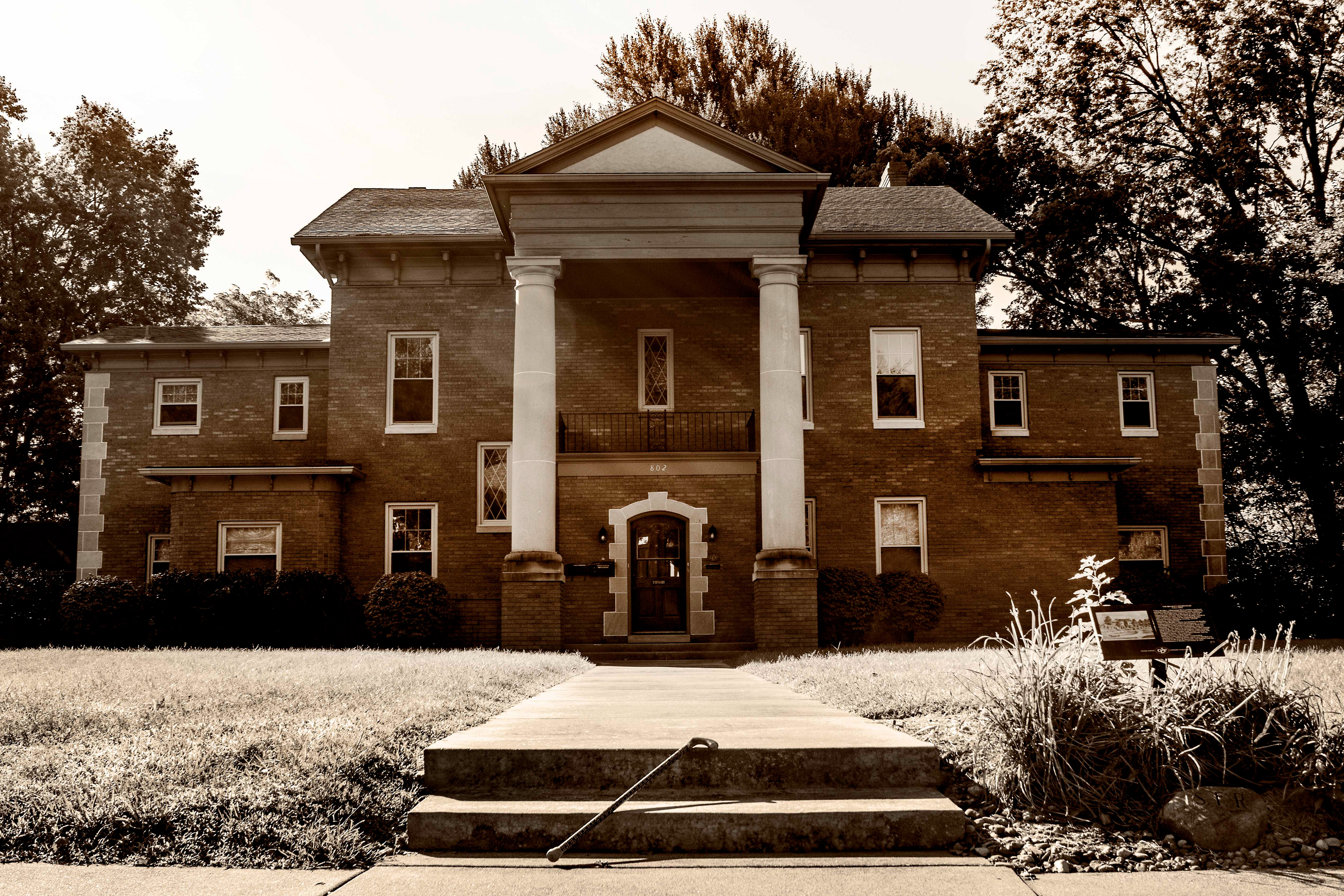 The intrusive repetition of her slow, hollow gate echoes in the stairwell while residents enjoy their evening meal.