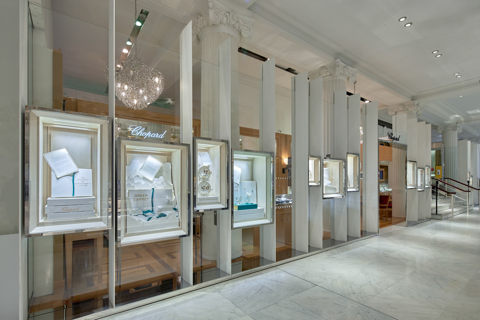 retail photography chopard ethical gold window display side view