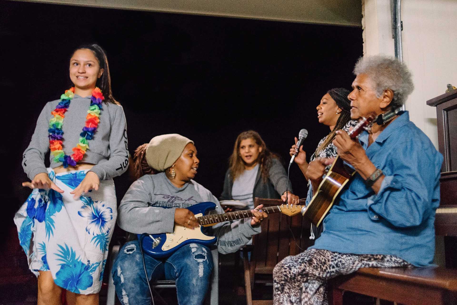 Multiple generations jamming and dancing. Australian South Sea Islanders / Aboriginal / Samoan. Photographed in Gladstone, Queensland, Australia on 5th April 2017.