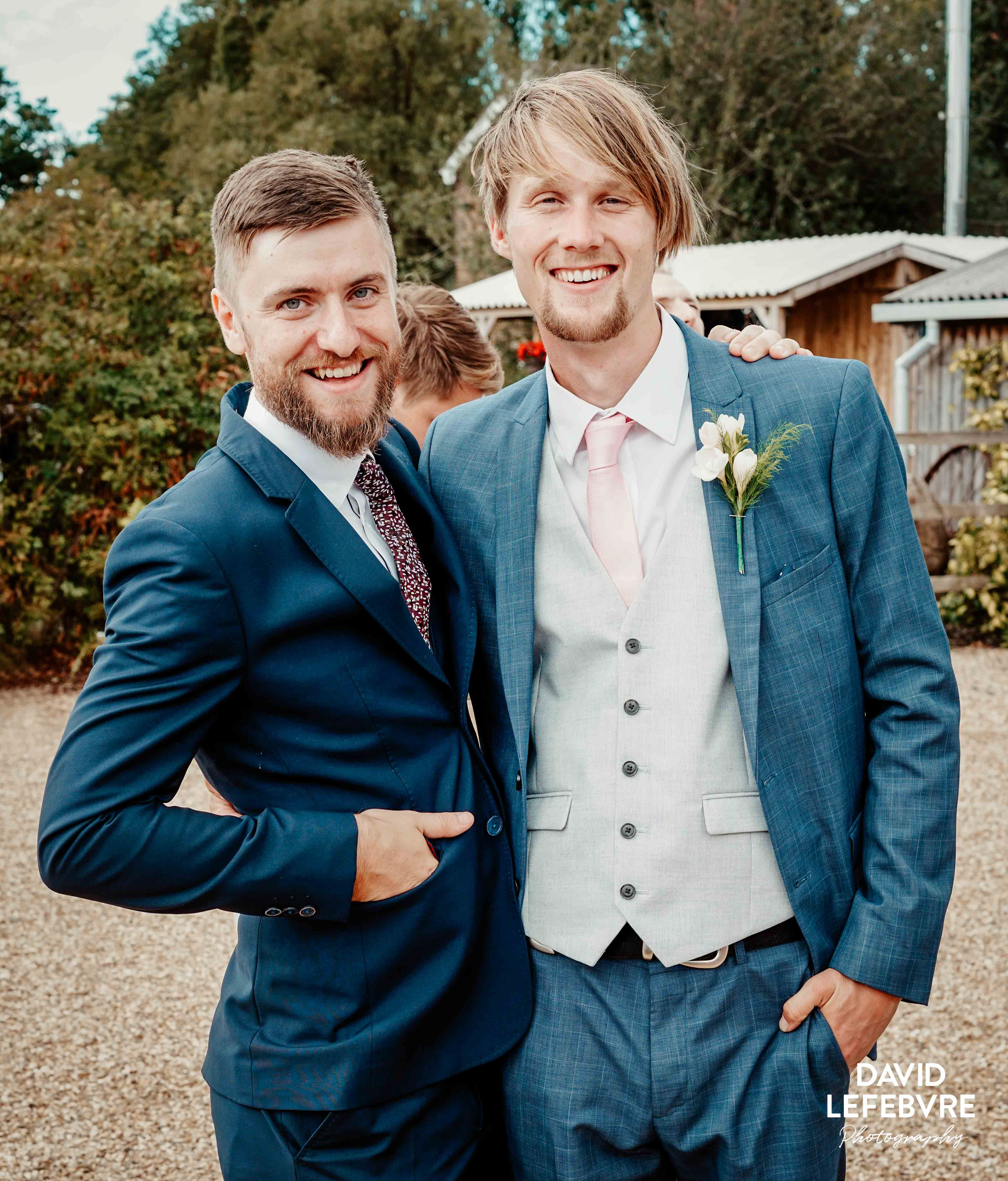 two men in suits at owen barn house wedding venue