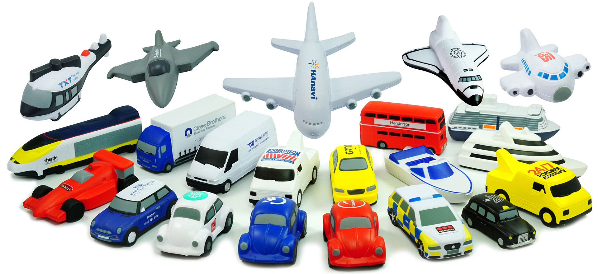 collection of stress reliever vehicles including planes trains and cars taken on a white background by product photographer david lefebvre