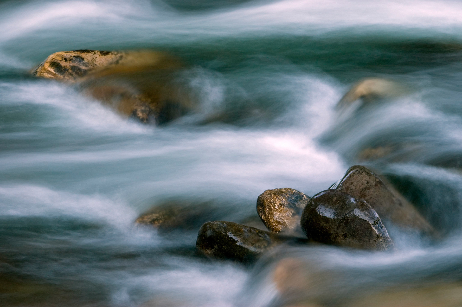 The water flows over the rocks of the North Fork of the South Branch of the Potomac River at the Seneca Rocks National Recreation Area in West Virginia.