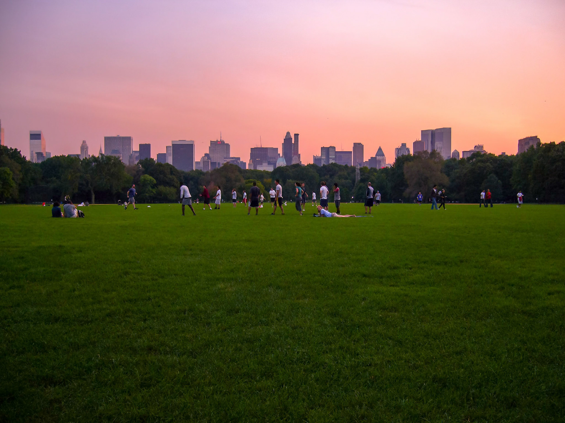 People relax at Central Park in Manhattan in New York City on a balmy September evening.