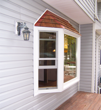Tilting double-hung sash replacement window.