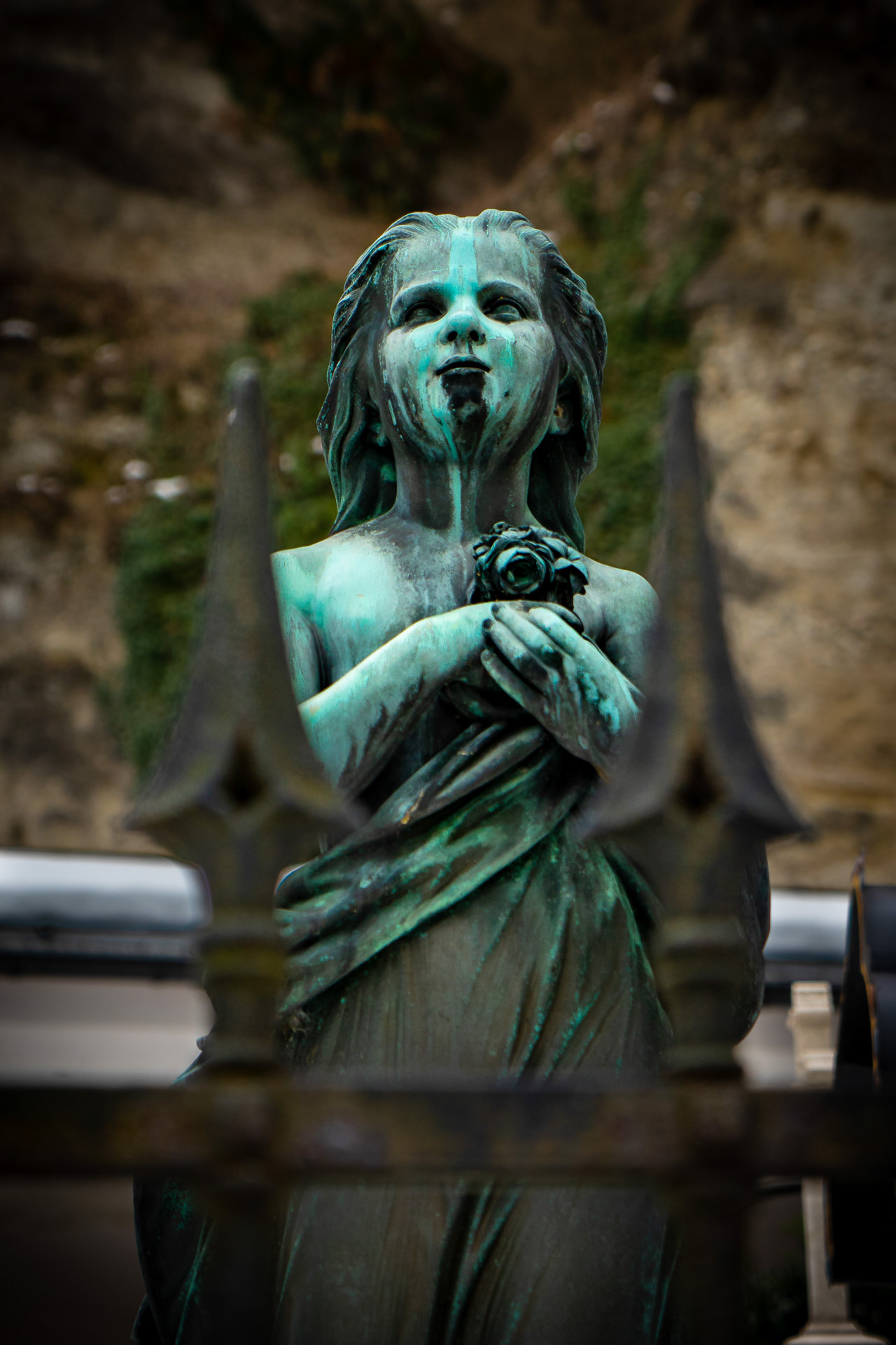 Statue on a grave in the cemetery Petersfriedhof