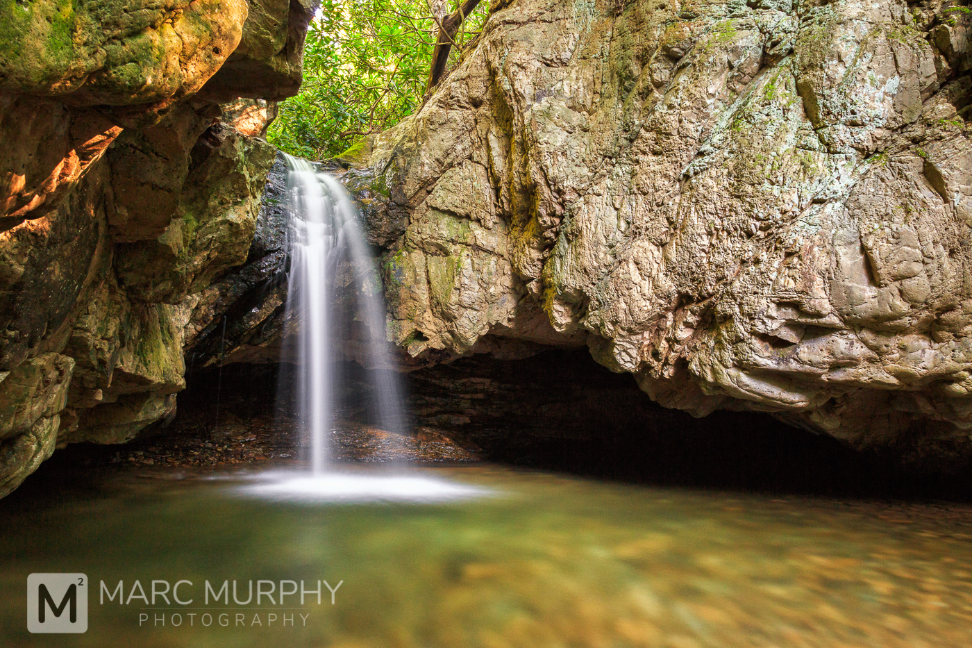 Blue Hole Falls East Tennessee Waterfall in Spring Surrounded by Large Rock Formations