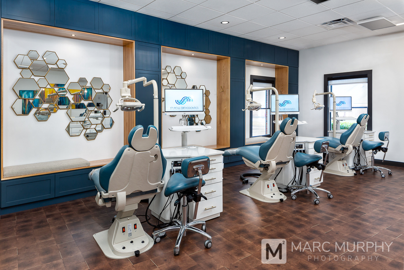 Sturgill Orthodontics Office Exam Room with Exam Chairs, Computers and Wall Mirrors