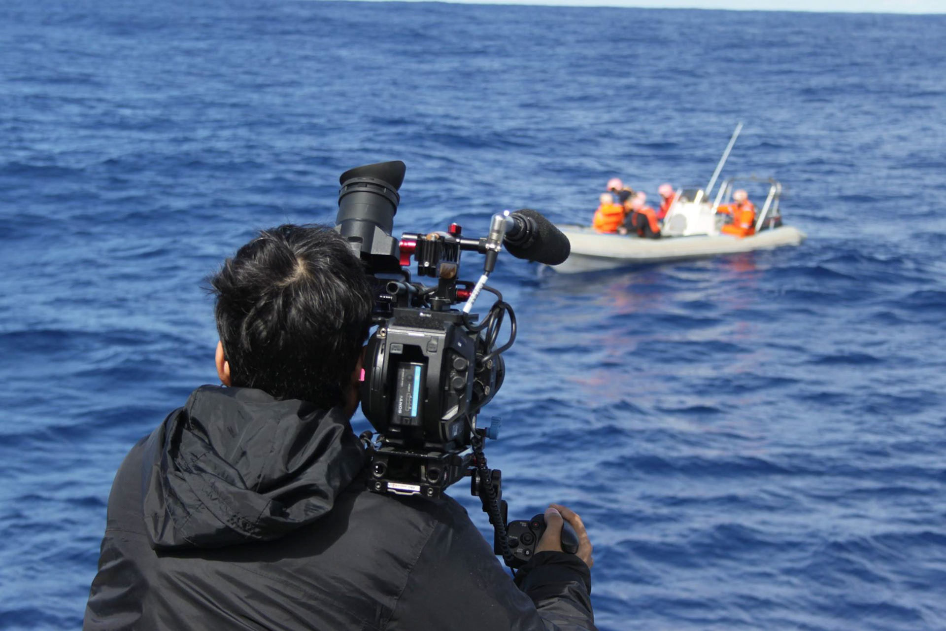 Dan grabs shots of the Oceanographers as they navigate back to the boat after retreiving the glider.