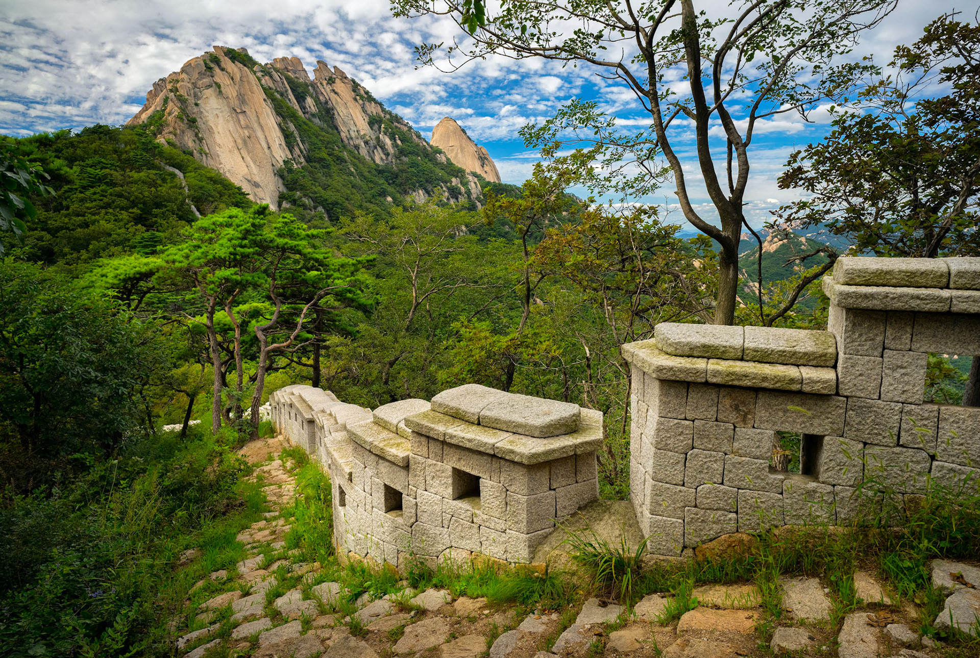 The view of mangyeongde ridge and with Insubong in the far distance, in Bukhansan National Park or South Korea.