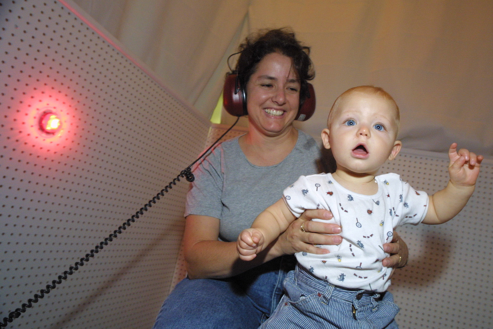 Reid LeBlanc grooves to the beat at prof. Linda Polka's lab at the School of Communication Sciences and Disorders.  He and mom Daphne Ducharme were participating in a study on how babies perceive music. September 2002.