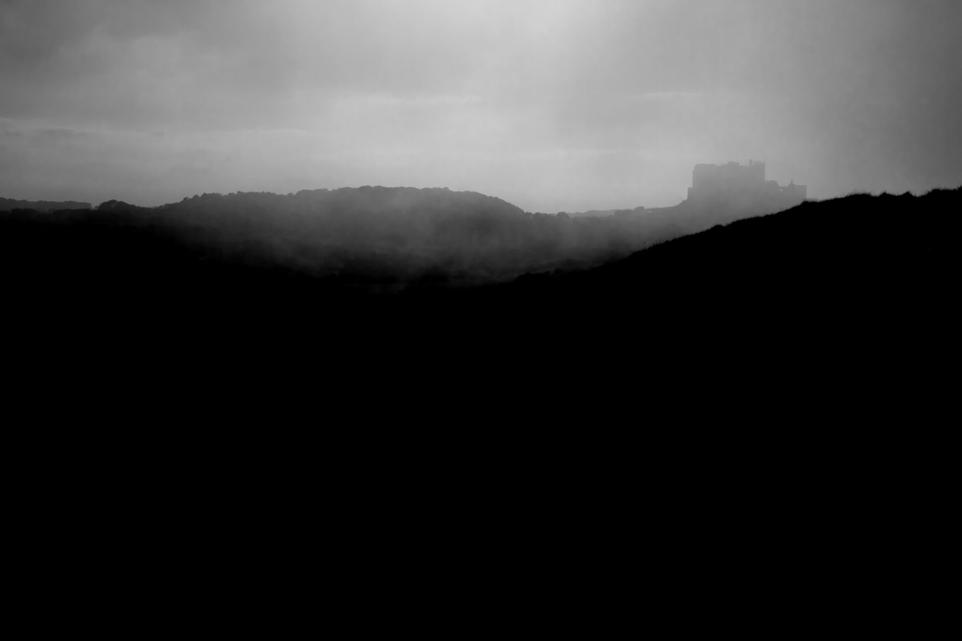 Bamburgh Castle Mist, Northumberland, by Ashley Taylor