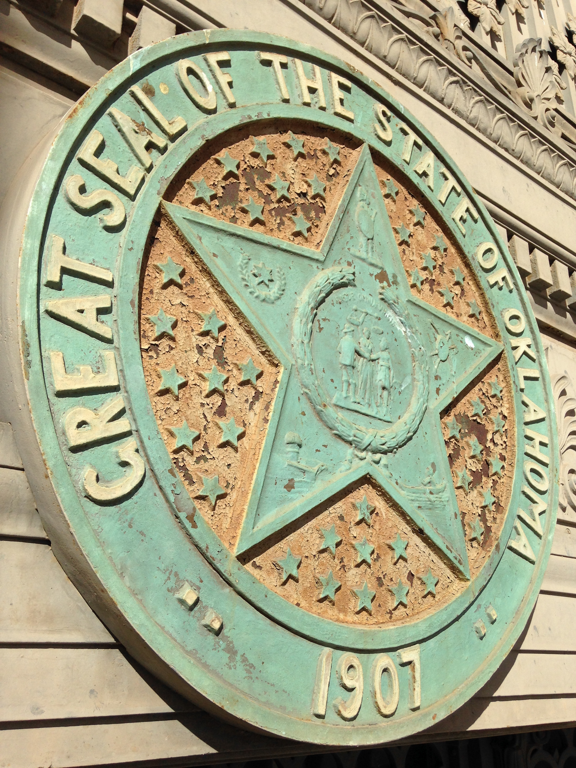 The seal above the doors had paint applied to differentiate various features.