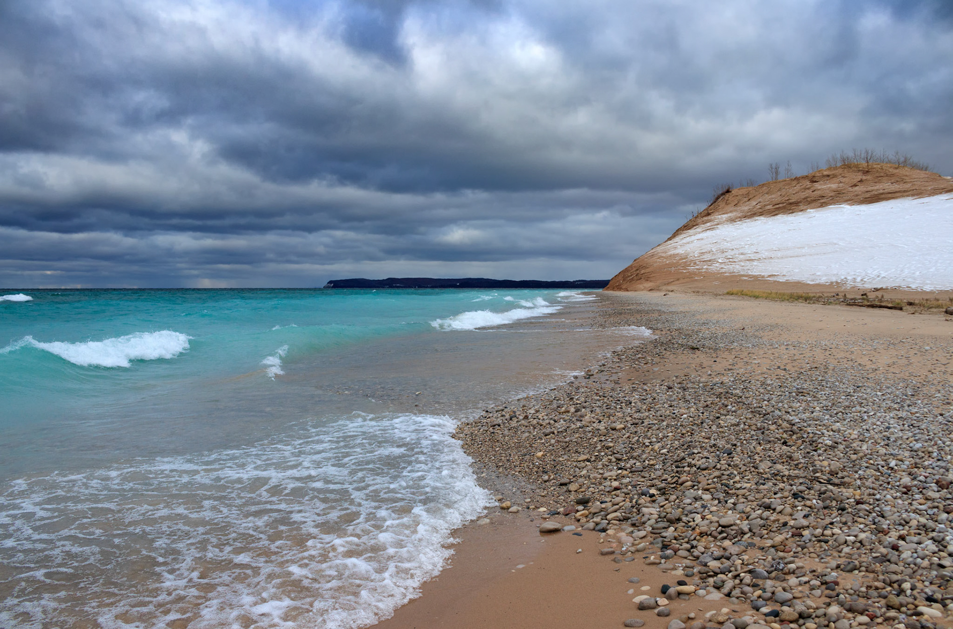 Gloomy skies and turquoise waters at Sleeping Bear Point, Sleeping Bear Dunes National Lakeshore, Michigan