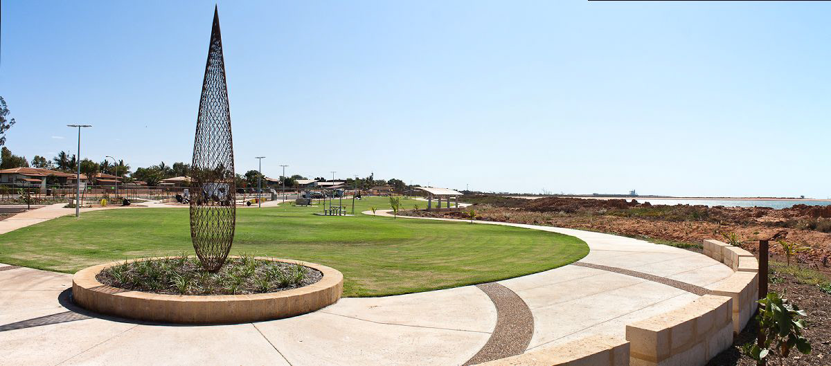 View west across the new park space, the scupture was relocated from the first stage