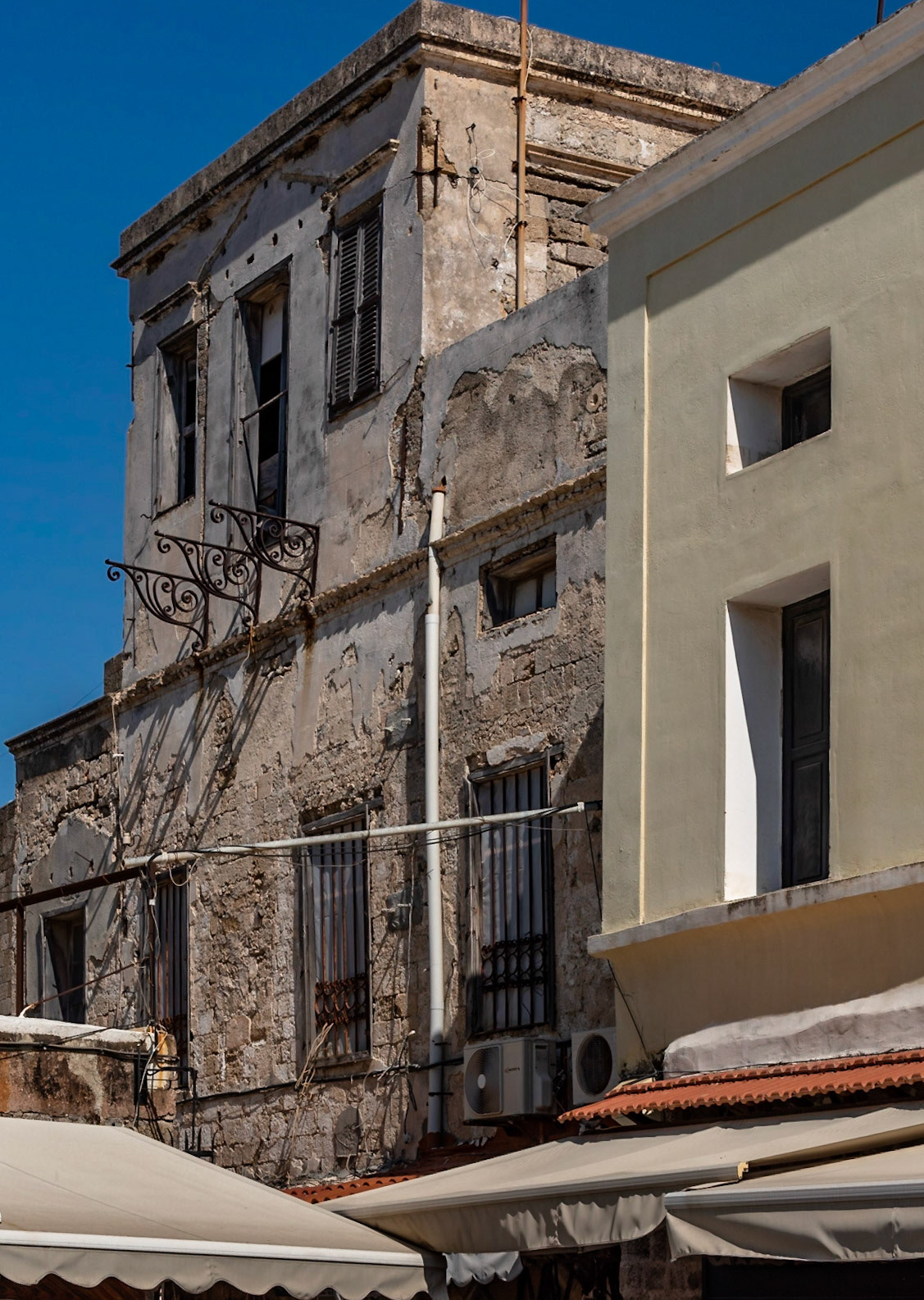 Rhodes Town, before & after refurbishment