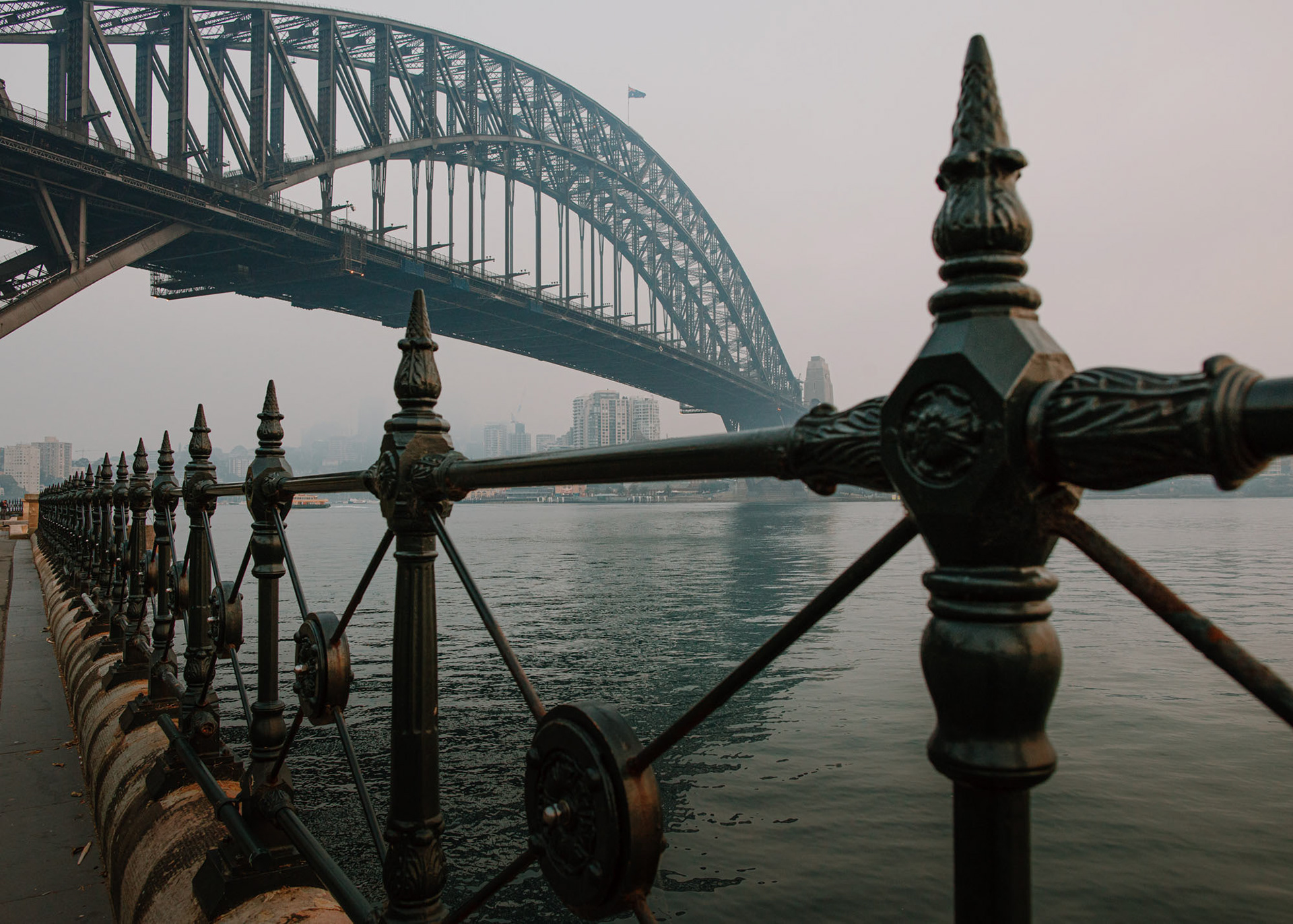 Sydney's harbour bridge shrouded in bush fire smoke haze