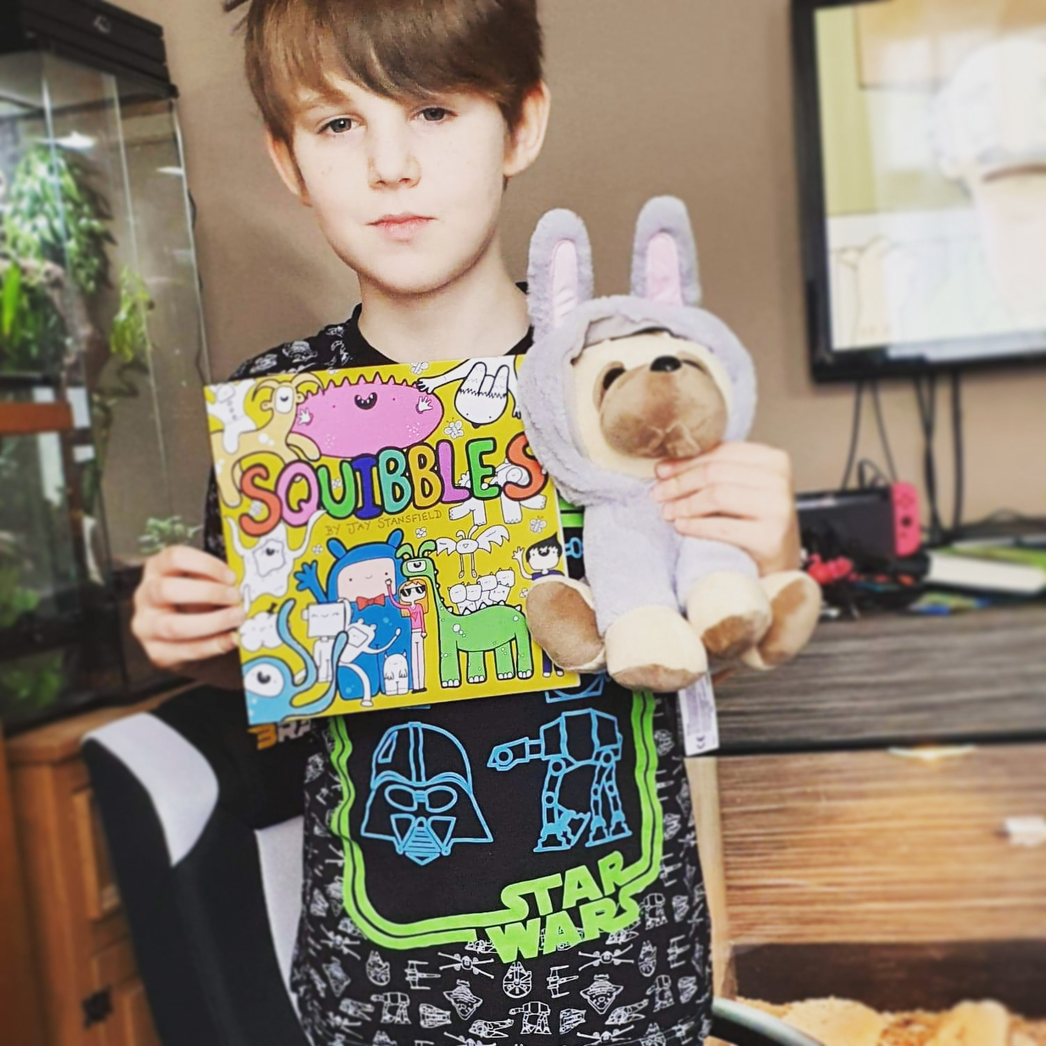 Squibbler with a copy of Squibbles