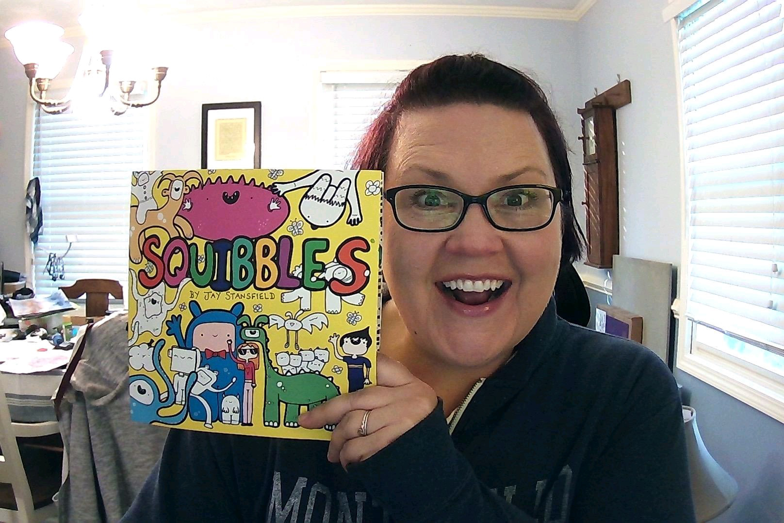 Squibbler with a copy of Squibbles