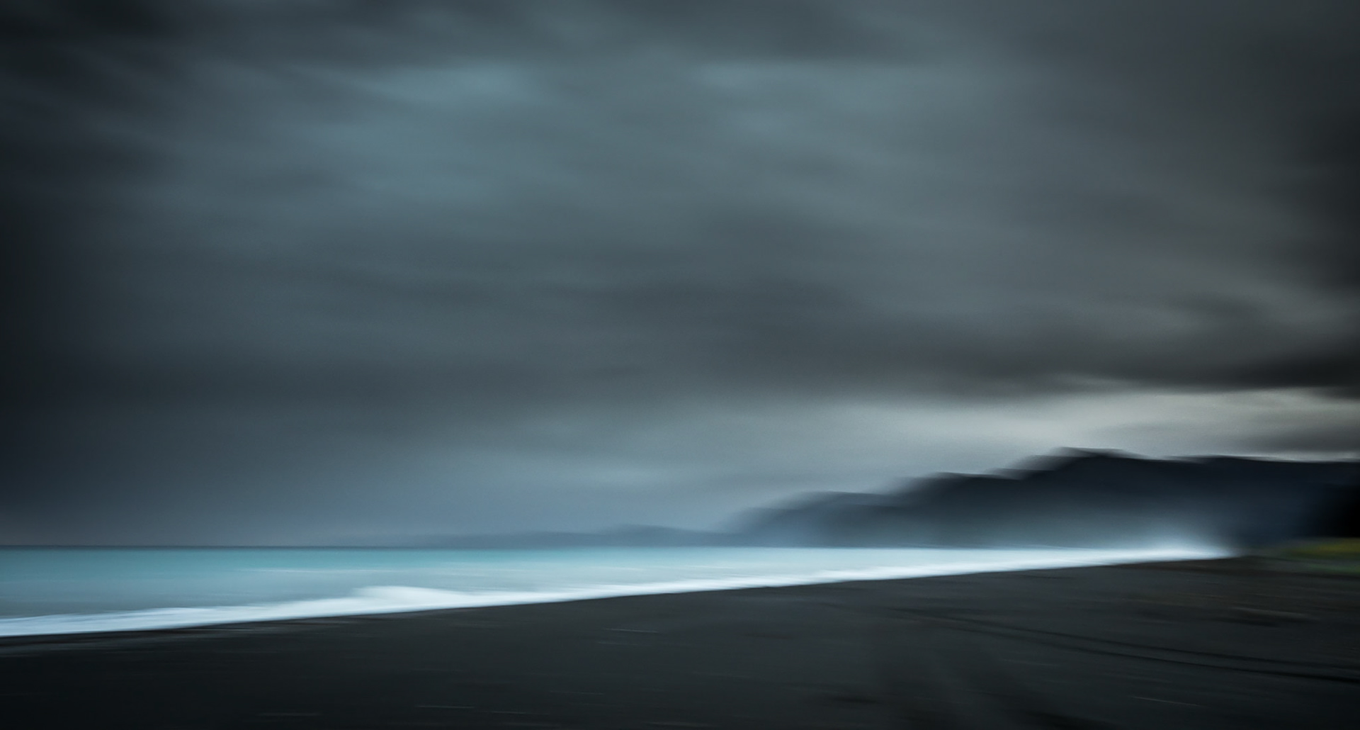 Breakers on Black Sand