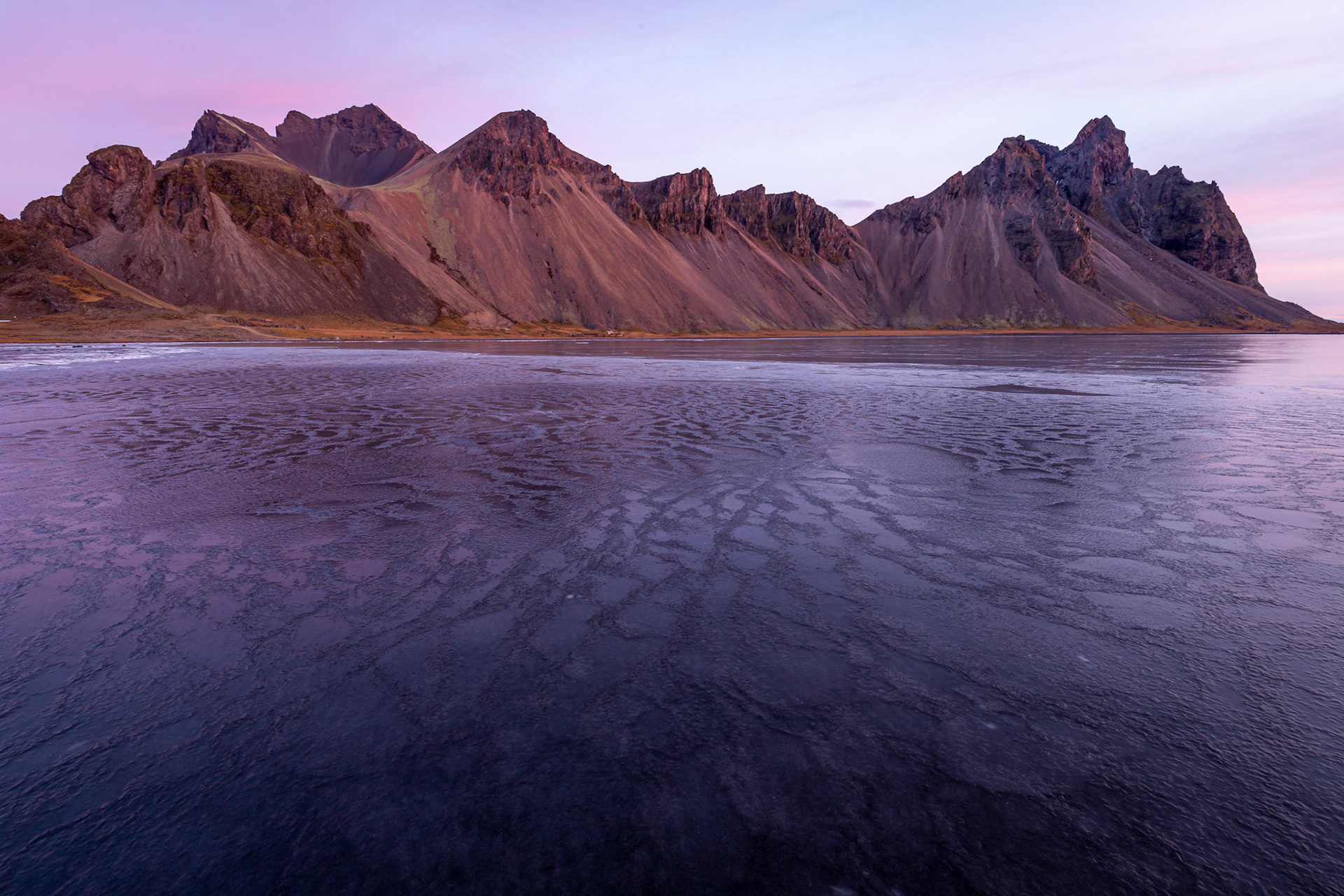 First Light on Vestrahorn - just before sunrise on the ice at Stokksnes, Iceland