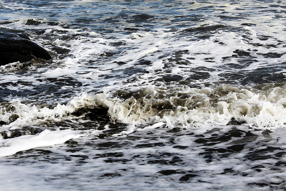 Waves at Muriwai Beach.