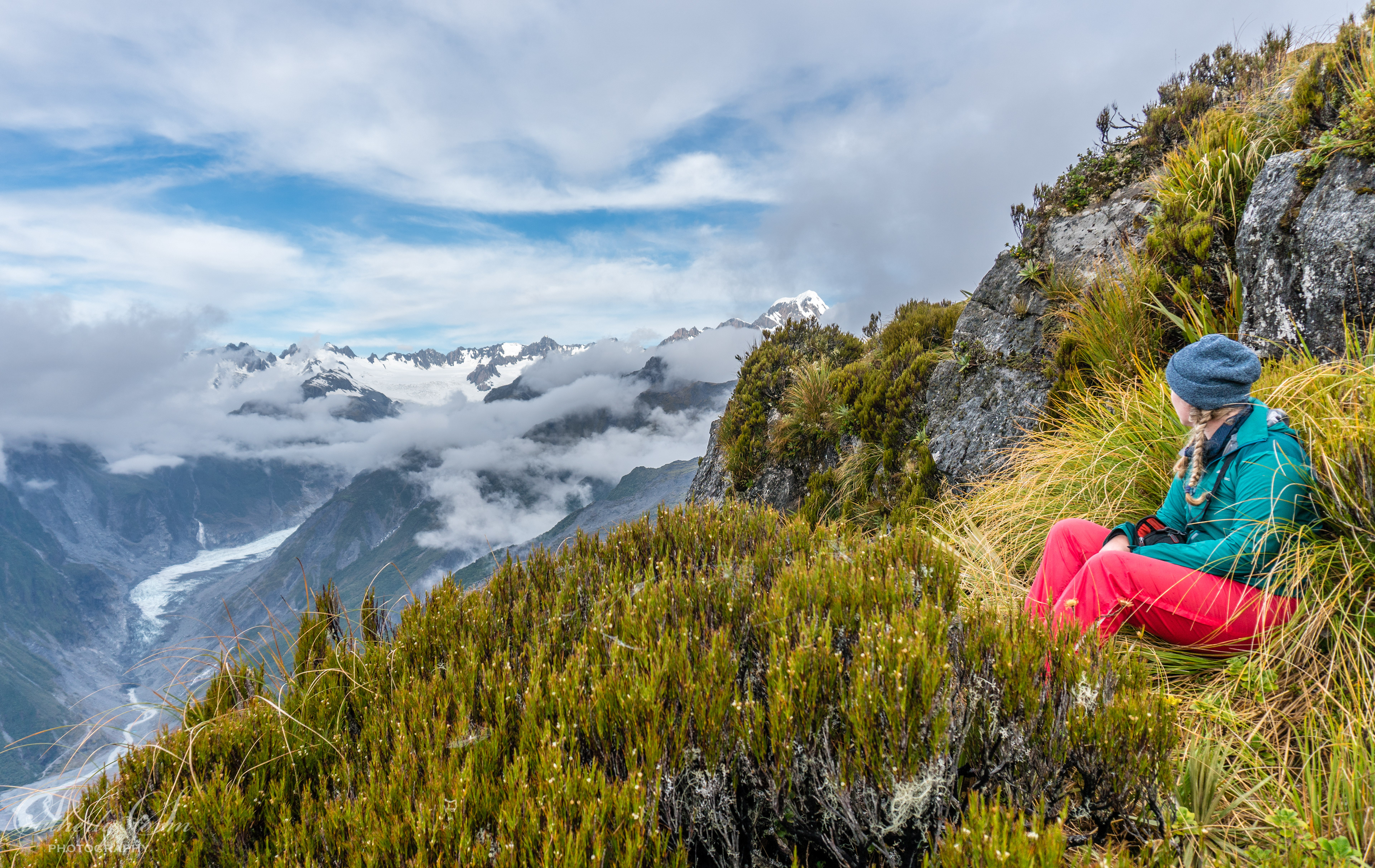 Tramper admires Mt Tasman and Fox Glacier