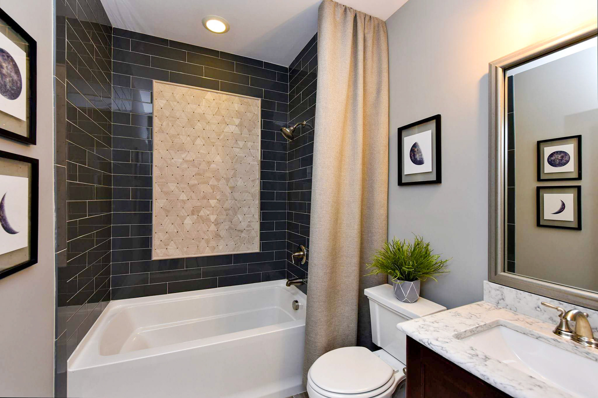 Personal Selections: Tile & lighting. Other selections made by Merchandising Concepts. Photo Credit: Stanley Martin Homes