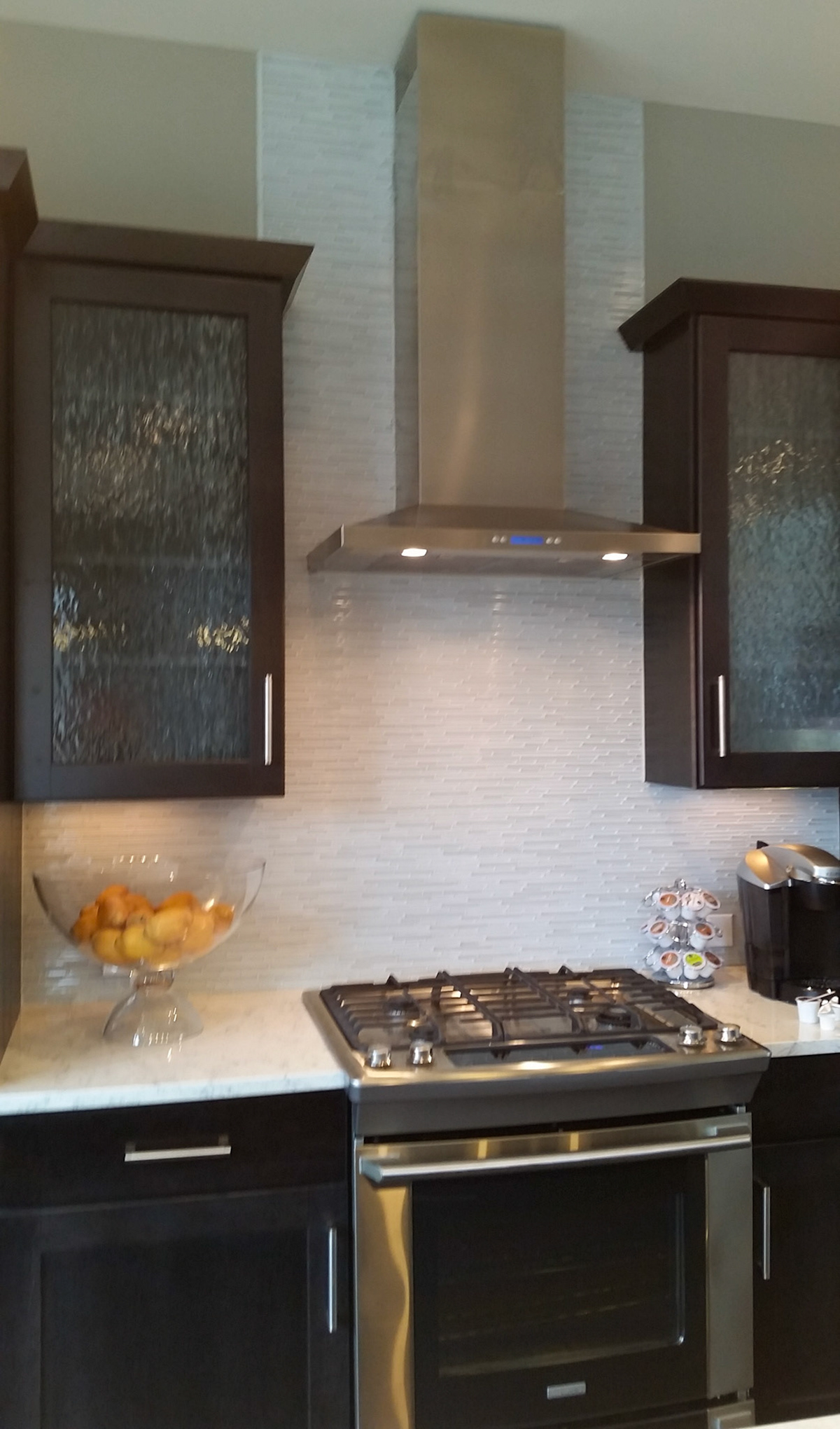 Personal Selections: Tile, flooring, and lighting. Other selections made by Model Home Interiors.