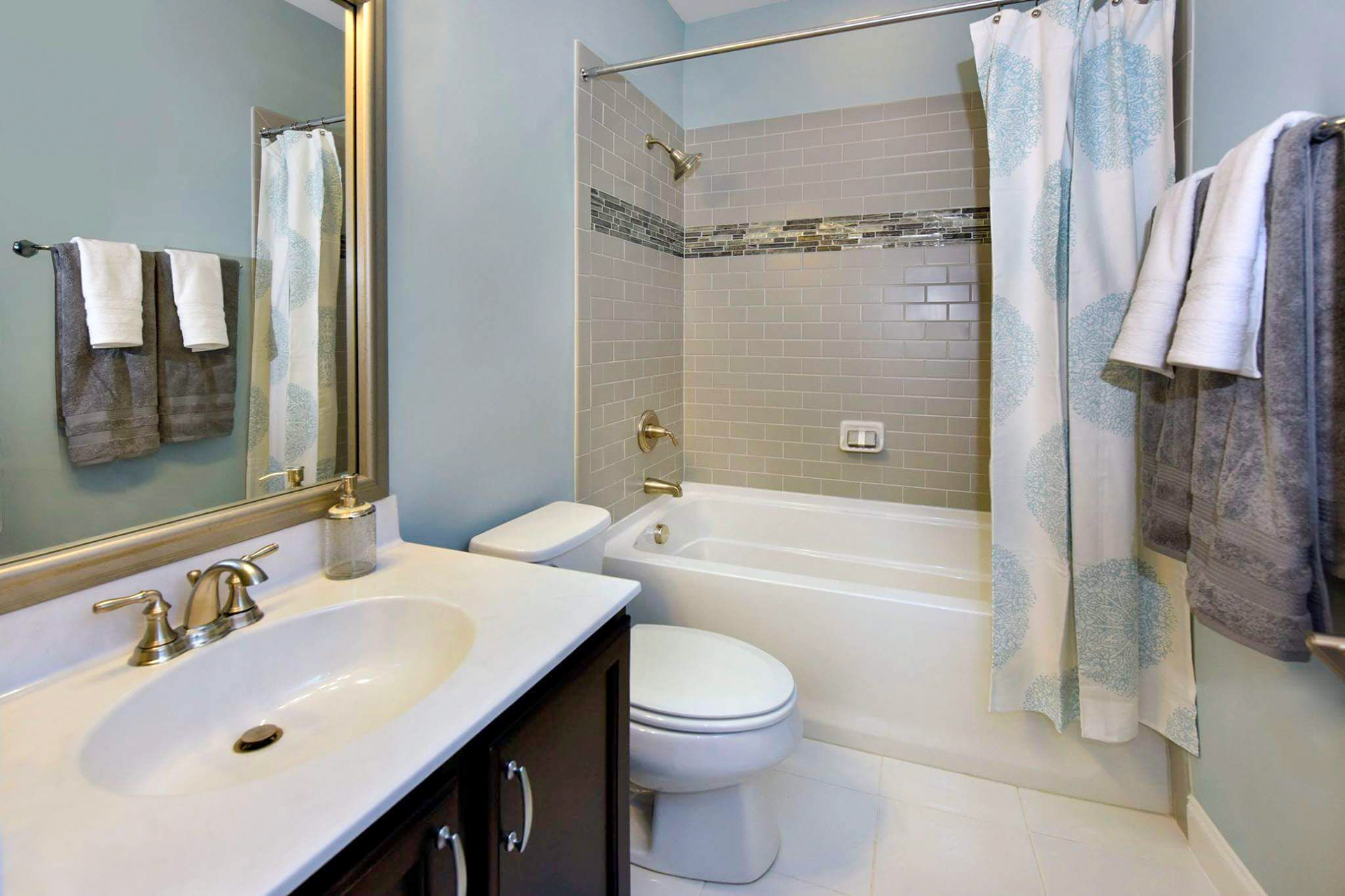 Personal Selections: Tile & lighting. Other selections made by Model Home Interiors. Photo Credit: Stanley Martin Homes.