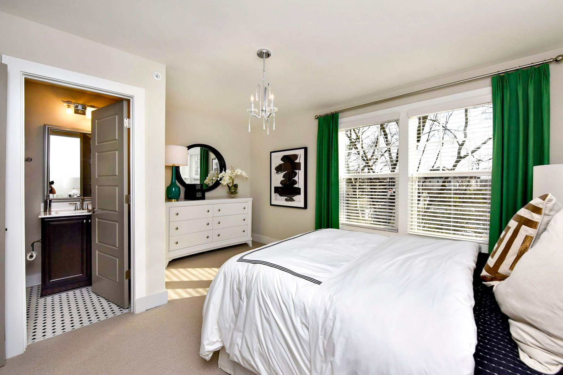 Personal Selections: Tile, flooring, and lighting. Other selections made by Model Home Interiors. Photo Credit: Stanley Martin Homes.