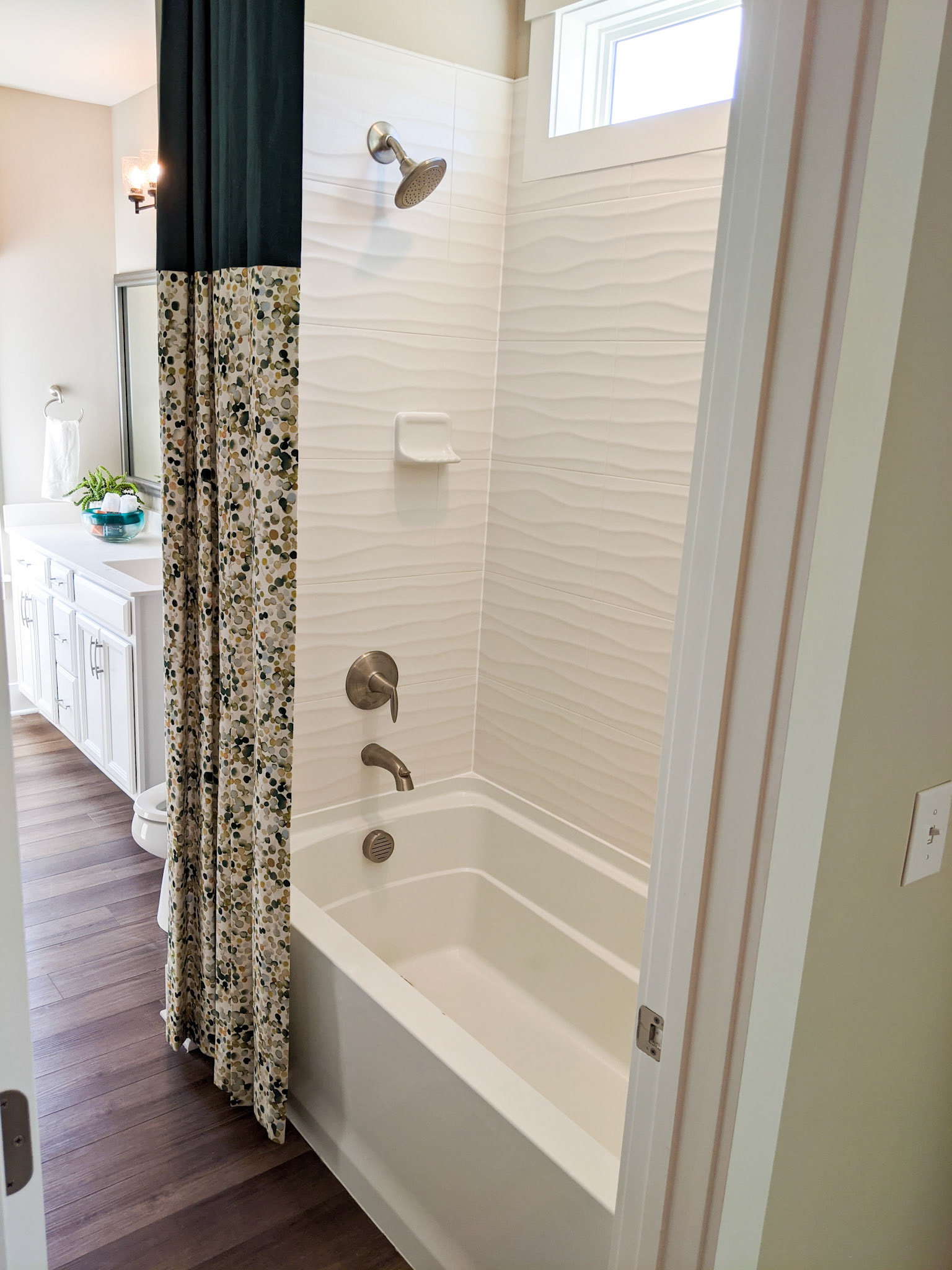 Personal Selections: Cabinets, counter top, hardware, plumbing, tile, and lighting. Other selections made by Model Home Interiors.