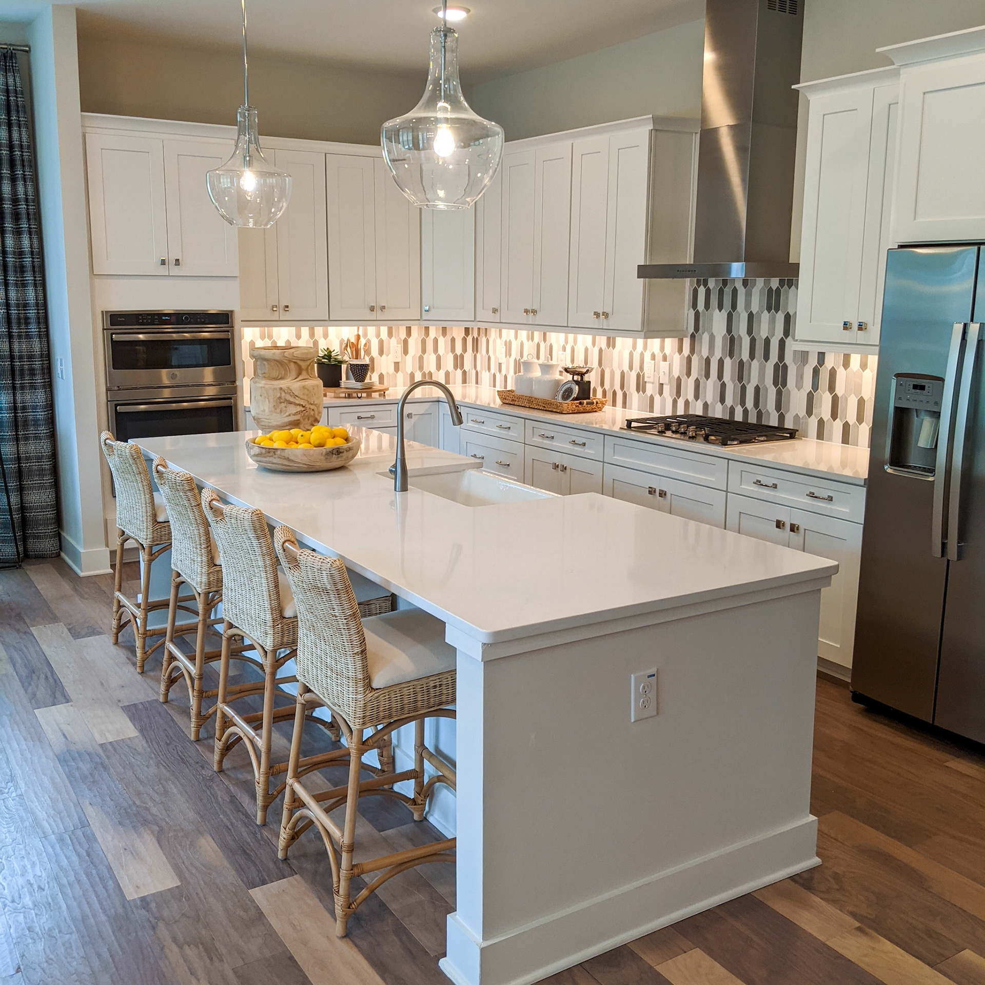 Personal Selections: Cabinets, counters, hardware, plumbing, flooring, tile, backsplash, appliances, and lighting. Other selections made by Model Home Interiors.