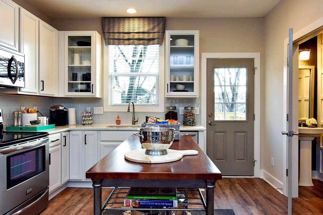 Personal Selections: Tile, flooring, and lighting. Other selections made by Model Home Interiors. Photo Credit: Stanley Martin Homes.
