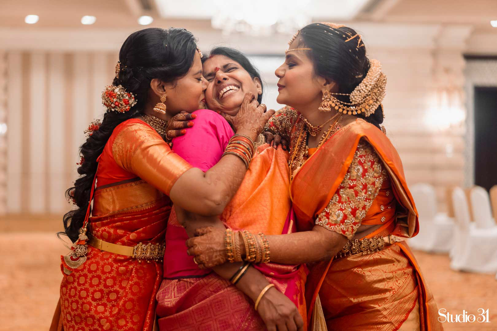 Emotional candid wedding moment by Studio 31 at Leela Palace, Chennai
