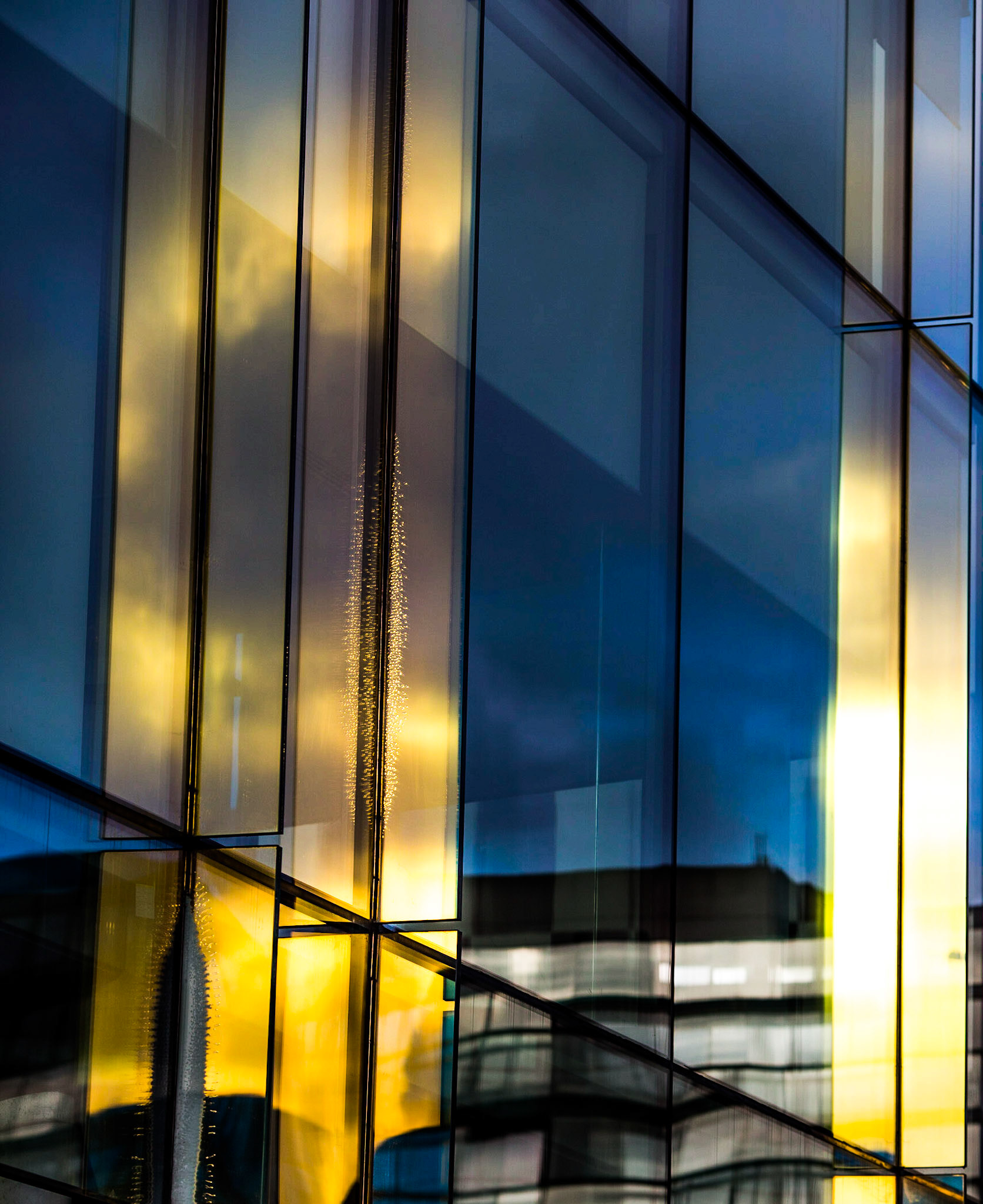 Reflecting Glass on Modern Building at Grand Canal Dock in Dublin