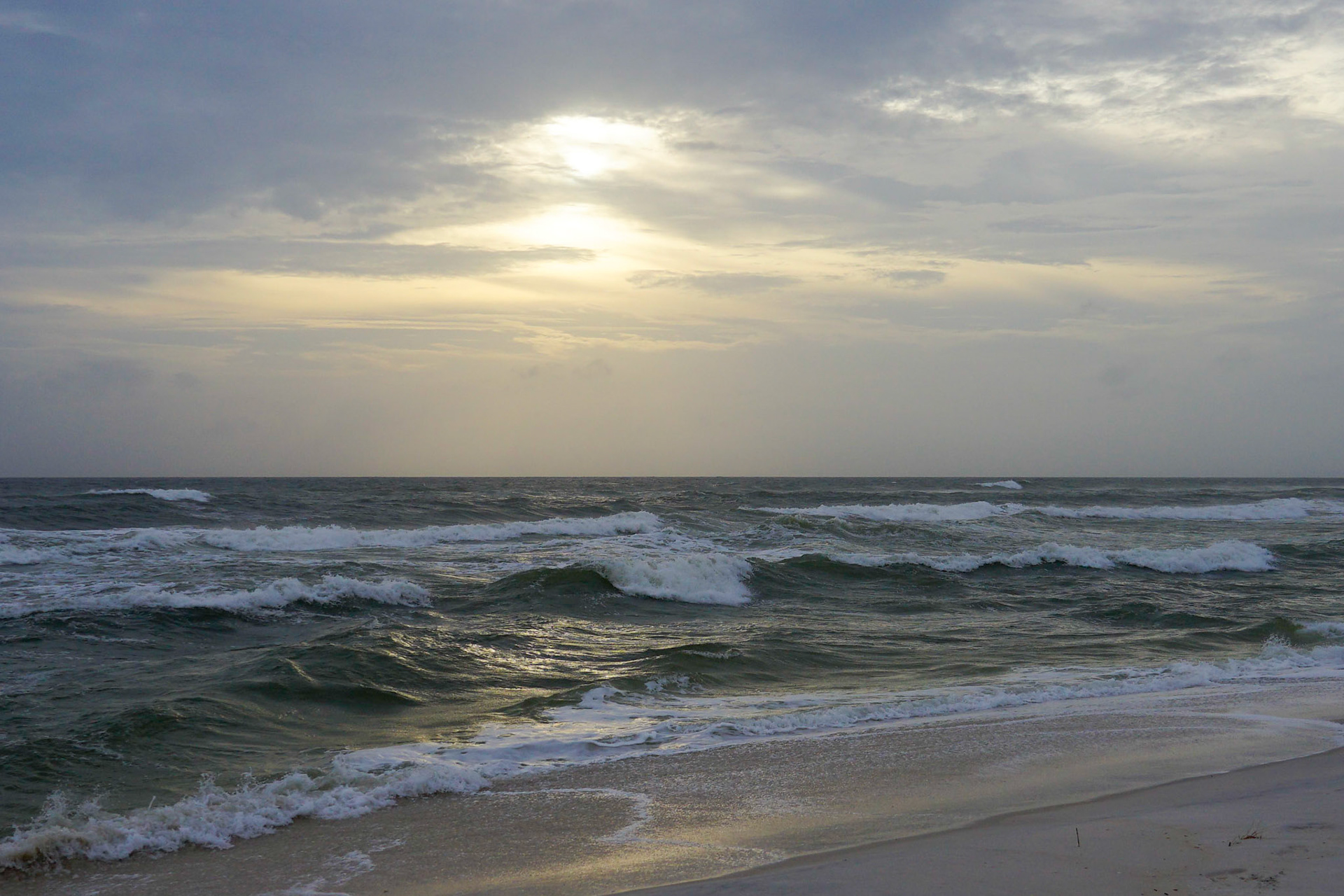 Horizon: Split horizon, equal parts sky and water/ground, 20201029, Panama City Beach, MILLER, As hurricane Zeta made landfall it created amazing cloud formations in the panhandle area of Florida. I wanted to the the horizon of this shot directly in the middle instead of on a rule of third because I felt the sky and the water with the beach had equal parts of interesting lines, light refractions, motion and uniqueness. Camera Settings: Sony A7 II, ISO 200, 24mm, f4, 1/1600s