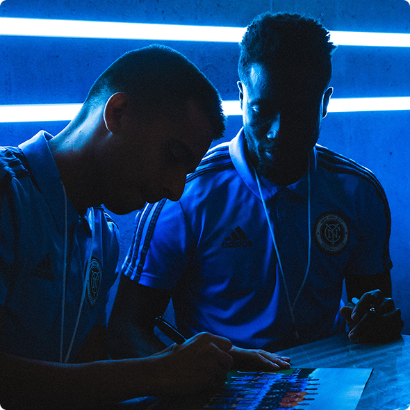 NYC FC players signing autographs