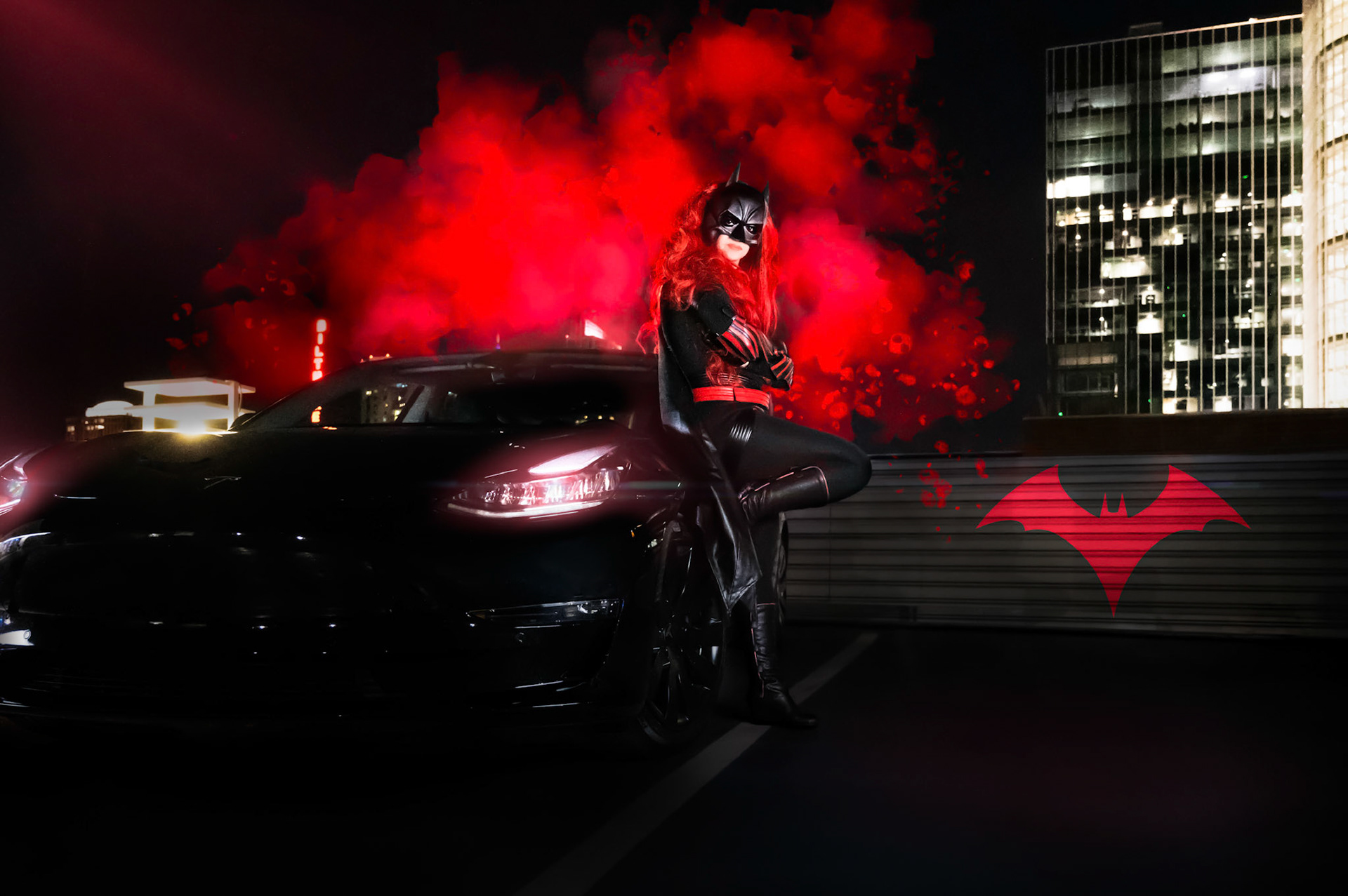 Batwoman and her Tesla Batmobile